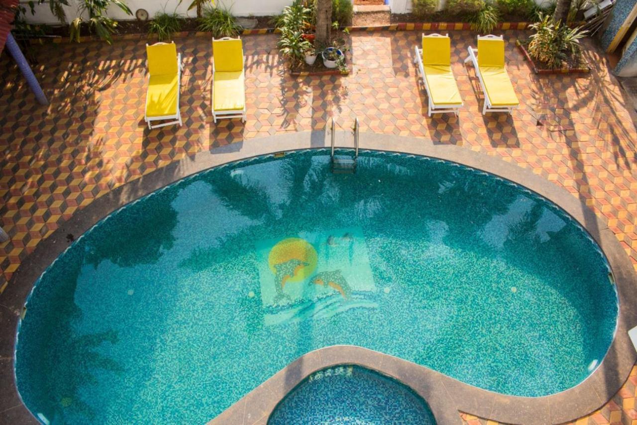 The Turquoiise House Hotel Morjim Bagian luar foto